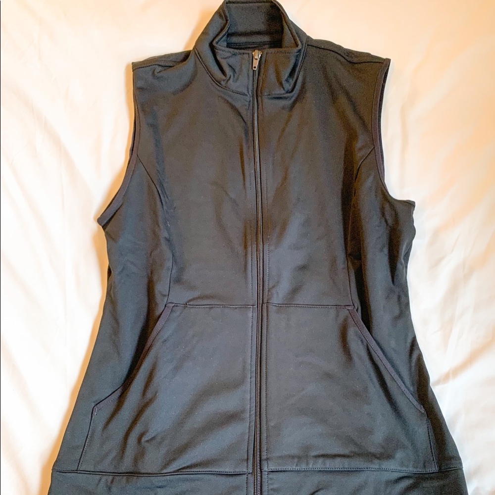 Women’s fleece scrub vest by “Cherokee”.
